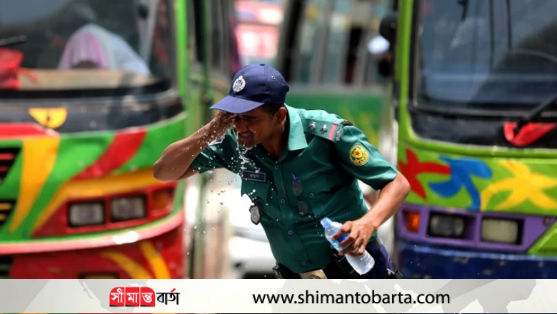 তপ্ত রোদে ঘামে ভিজে সড়ক সামলাচ্ছে ট্রাফিক পুলিশ